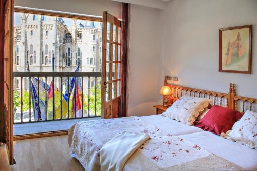 Postel nebo postele na pokoji v ubytování Hotel Gaudi