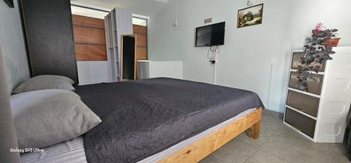 Postel nebo postele na pokoji v ubytování Piscines Privées et Chauffées, Private Heated Pools