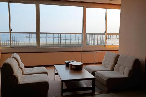 Χώρος καθιστικού στο Grand Hotel Taiyo