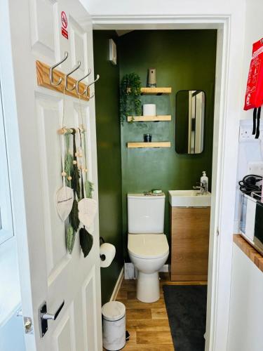 a bathroom with a toilet and a sink at Your Harrogate Stay in Harrogate