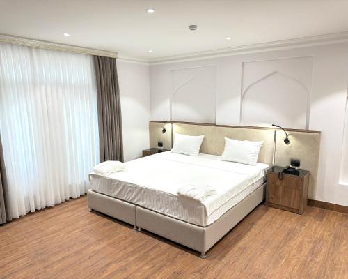 Ένα ή περισσότερα κρεβάτια σε δωμάτιο στο Hotel Misgaron