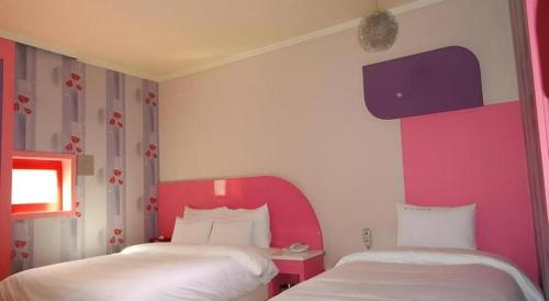 Letto o letti in una camera di Nabiya Hotel