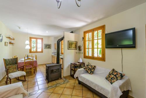 Postel nebo postele na pokoji v ubytování La Casita con piscina privada de tres dormitorios