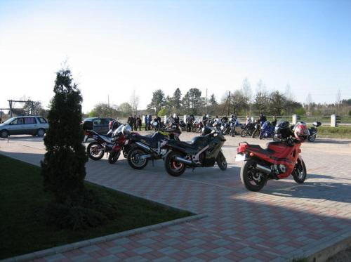 a group of motorcycles parked in a parking lot at Oškrogs in Ķegums