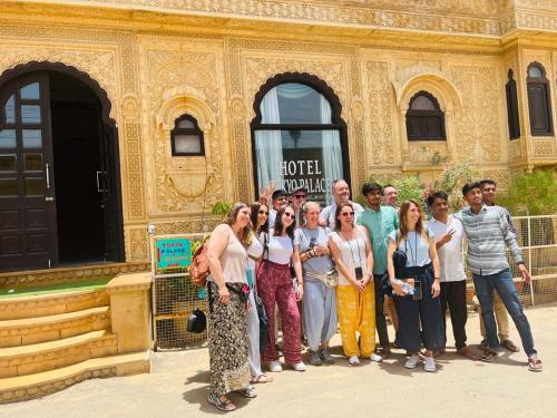 a group of people standing in front of a building at Hotel Tokyo Palace in Jaisalmer