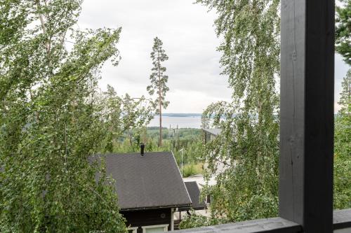 a view from the roof of a house at Peaceful 2BR Getaway Cabin at the Top of Riihivuori in Muurame