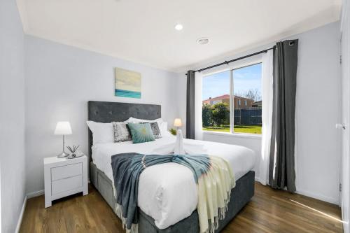 Ένα ή περισσότερα κρεβάτια σε δωμάτιο στο Spacious 4BR 2bath Family Home near Casey Central