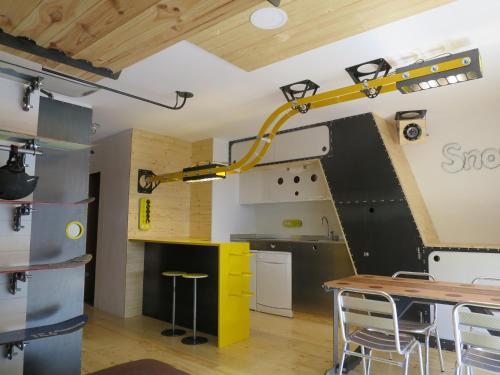 Una cocina o zona de cocina en SnowSun -Vacances Pirinenca