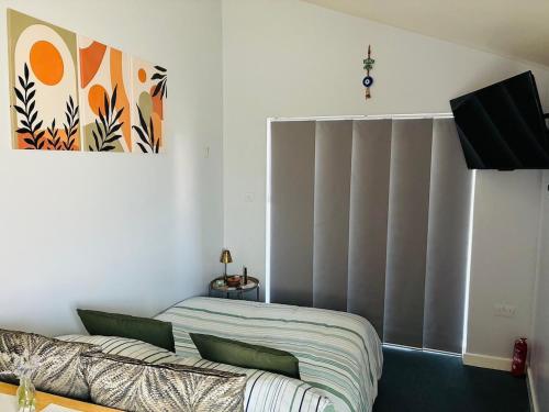 Μια τηλεόραση ή/και κέντρο ψυχαγωγίας στο A Cosy Harrogate Hideaway