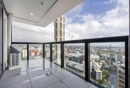 an empty balcony with a view of a city at Just opposite to Skytower, 2 Bed 2 Bath in CBD in Auckland