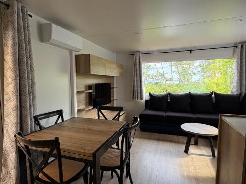 Χώρος καθιστικού στο Mobilhome haut de gamme avec vue exceptionnelle sur le Bassin Arcachon - 6 Personnes
