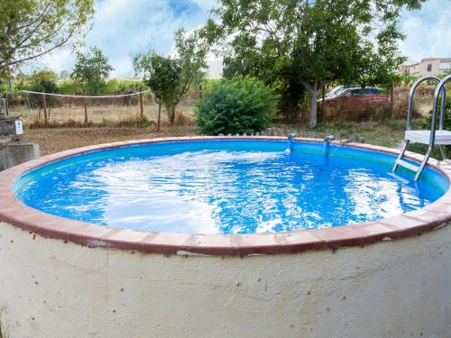 Bazén v ubytování Masia Can Teulera nebo v jeho okolí