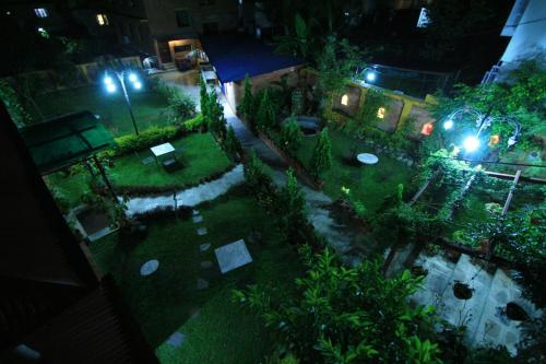 an aerial view of a garden at night at Royal Astoria Hotel in Kathmandu