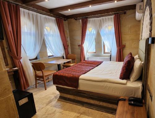 Katil atau katil-katil dalam bilik di Capavista Cave House