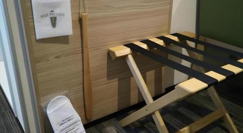 a room with a bunk bed next to a door at KEIKYU EX INN Haneda Innovation City 2 minutes walk from HICity Exit of Tenkubashi Station in Tokyo
