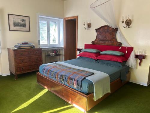 Postel nebo postele na pokoji v ubytování La Casa Blu di Monasteto