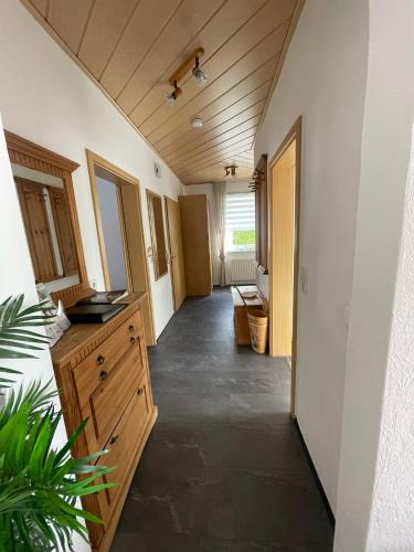 an empty hallway of a room with a bathroom at Country Style meets Modern in Selb