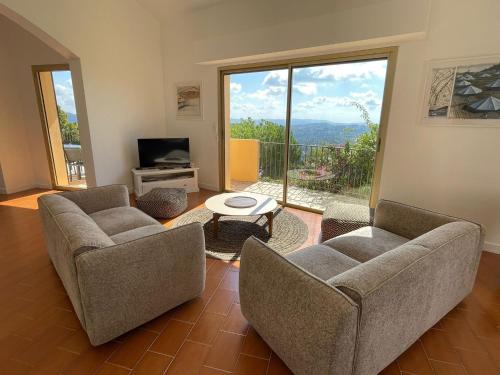 Χώρος καθιστικού στο Villa La Baume 10 couchages, piscine, vue mer Le Tignet 06