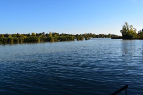 a view of a large body of water at Tücsi lak in Szigetszentmárton