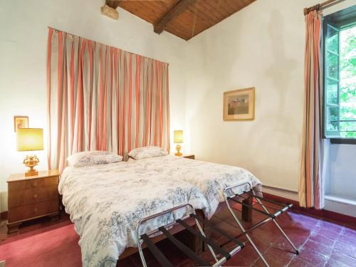 Postel nebo postele na pokoji v ubytování Guest House in Monferrato with Wine Tasting