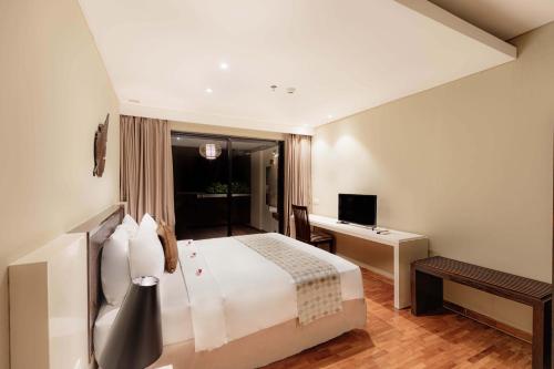 Ένα ή περισσότερα κρεβάτια σε δωμάτιο στο The Sterling Villas