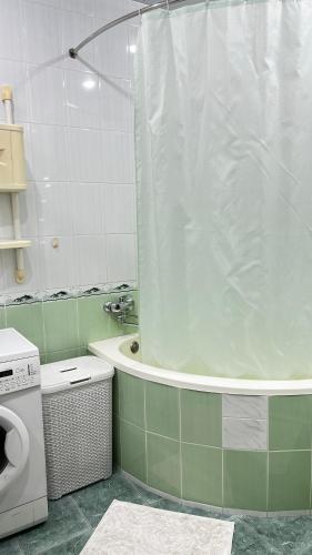 Vannas istaba naktsmītnē Квартира в спальном районе Ташкента