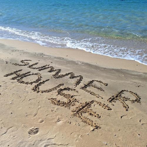 itzerland written in the sand on the beach at SUMMER House 2 in Vívlos