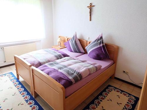 Ένα ή περισσότερα κρεβάτια σε δωμάτιο στο Eifel Garden Hideaway