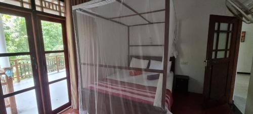 Letto o letti in una camera di Breath House Hiriketiya