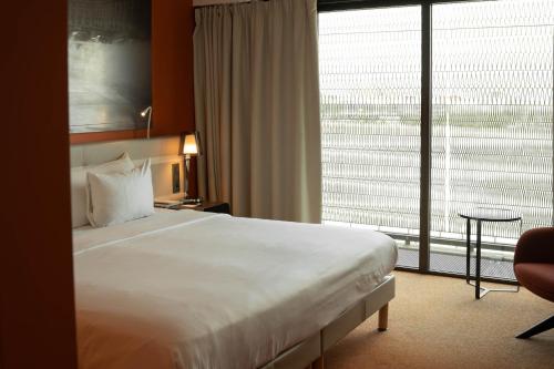 Postel nebo postele na pokoji v ubytování Radisson Blu Hotel Bordeaux