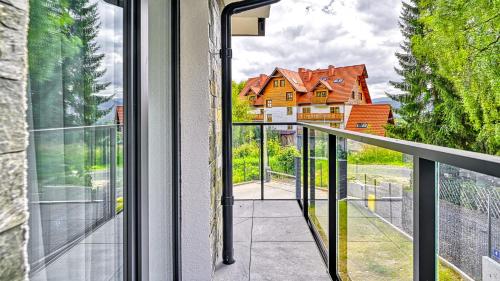 Balkón nebo terasa v ubytování Apartamenty butikowe PINE by Royal Aparts
