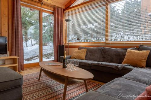 Χώρος καθιστικού στο Superbe chalet 6 ch. au pied du domaine des 2 Alpes