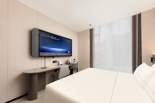Μια τηλεόραση ή/και κέντρο ψυχαγωγίας στο Atour Light Hotel Pazhou Exhibition Center Kecun Subway Station