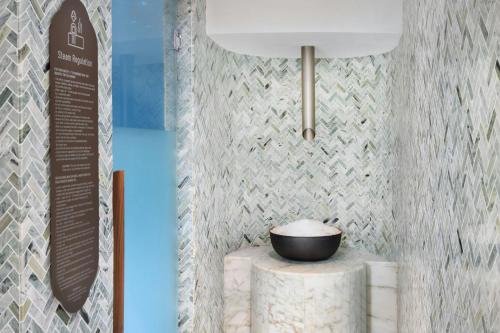 a room with a bowl on top of a table at Lampung Marriott Resort & Spa in Lampung