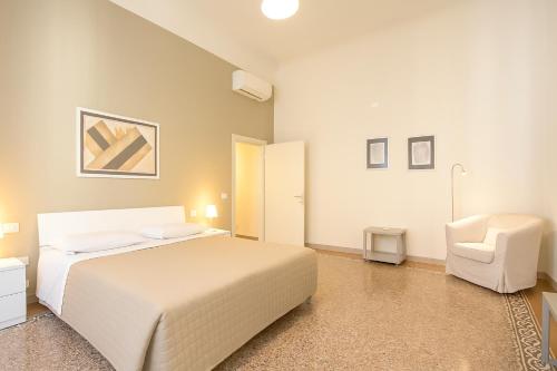 Ένα ή περισσότερα κρεβάτια σε δωμάτιο στο Regis Condo