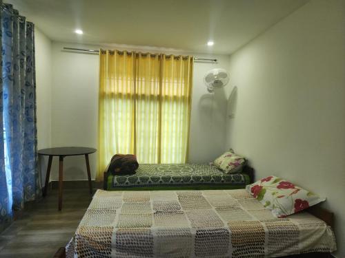 Ένα ή περισσότερα κρεβάτια σε δωμάτιο στο Luna homestay