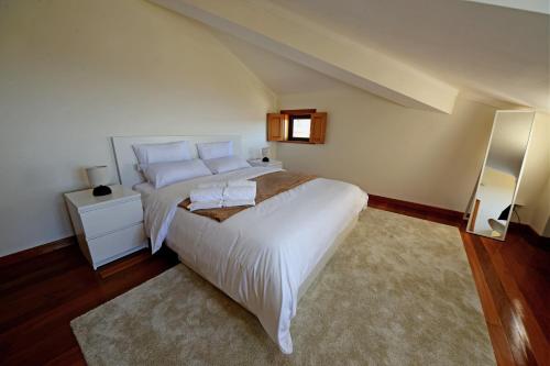 Postel nebo postele na pokoji v ubytování Mangualde BnB