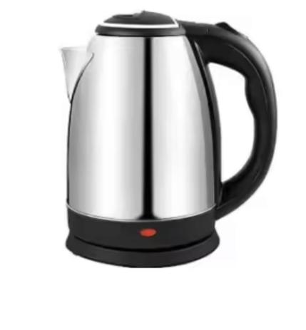 a black and white tea kettle on a white background at Nature's Hideaway in Anuradhapura