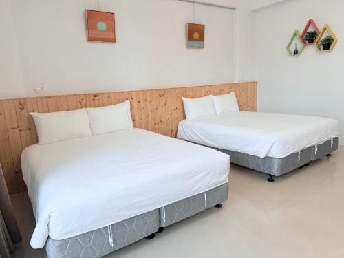 Katil atau katil-katil dalam bilik di Xiaodou B&B