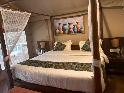 Katil atau katil-katil dalam bilik di Goya Gate Beach Resort