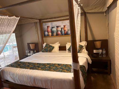 Katil atau katil-katil dalam bilik di Goya Gate Beach Resort