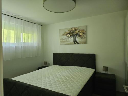 Postel nebo postele na pokoji v ubytování Apartment Sebastian