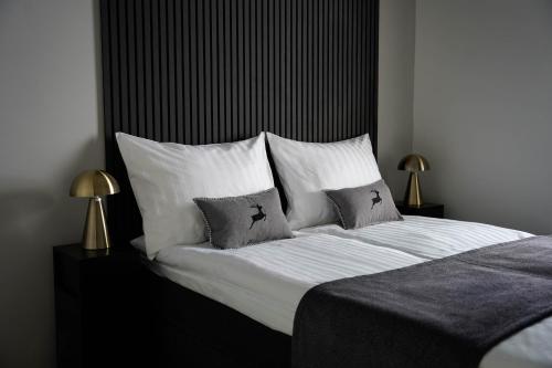 Ένα ή περισσότερα κρεβάτια σε δωμάτιο στο Premium Apartment With Sauna & Parking - Lapnest