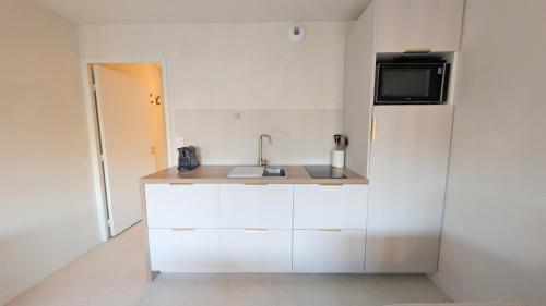 Appart cosy, 2 pièces, clim, parking privée, tout équipé, face au port de Santa Lucia