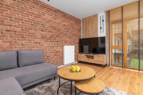 Foto Sienna Grobla Klimatyczny Apartament z Parkingiem by Noclegi Renters 1