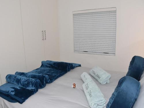 Katil atau katil-katil dalam bilik di Seaview Holiday Villa