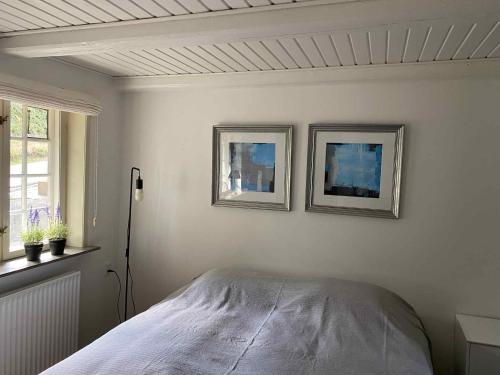 Ένα ή περισσότερα κρεβάτια σε δωμάτιο στο Dream House With View Of The Little Belt