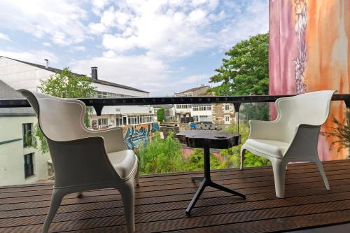 Glam Taoo Hotel Apartamento Boutiqueにあるバルコニーまたはテラス