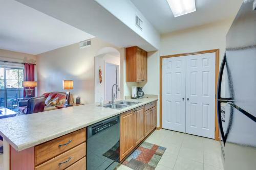 a kitchen with a sink and a counter top at Sunny Mesa Condo with Pool, Patio & Grill in Mesa