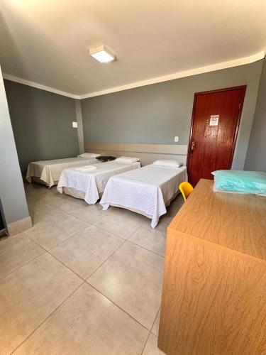 Postel nebo postele na pokoji v ubytování Hotel Boa Viagem